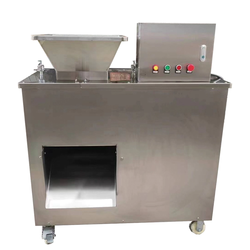 Automated food byproduct shredding system for continuous commercial waste management.