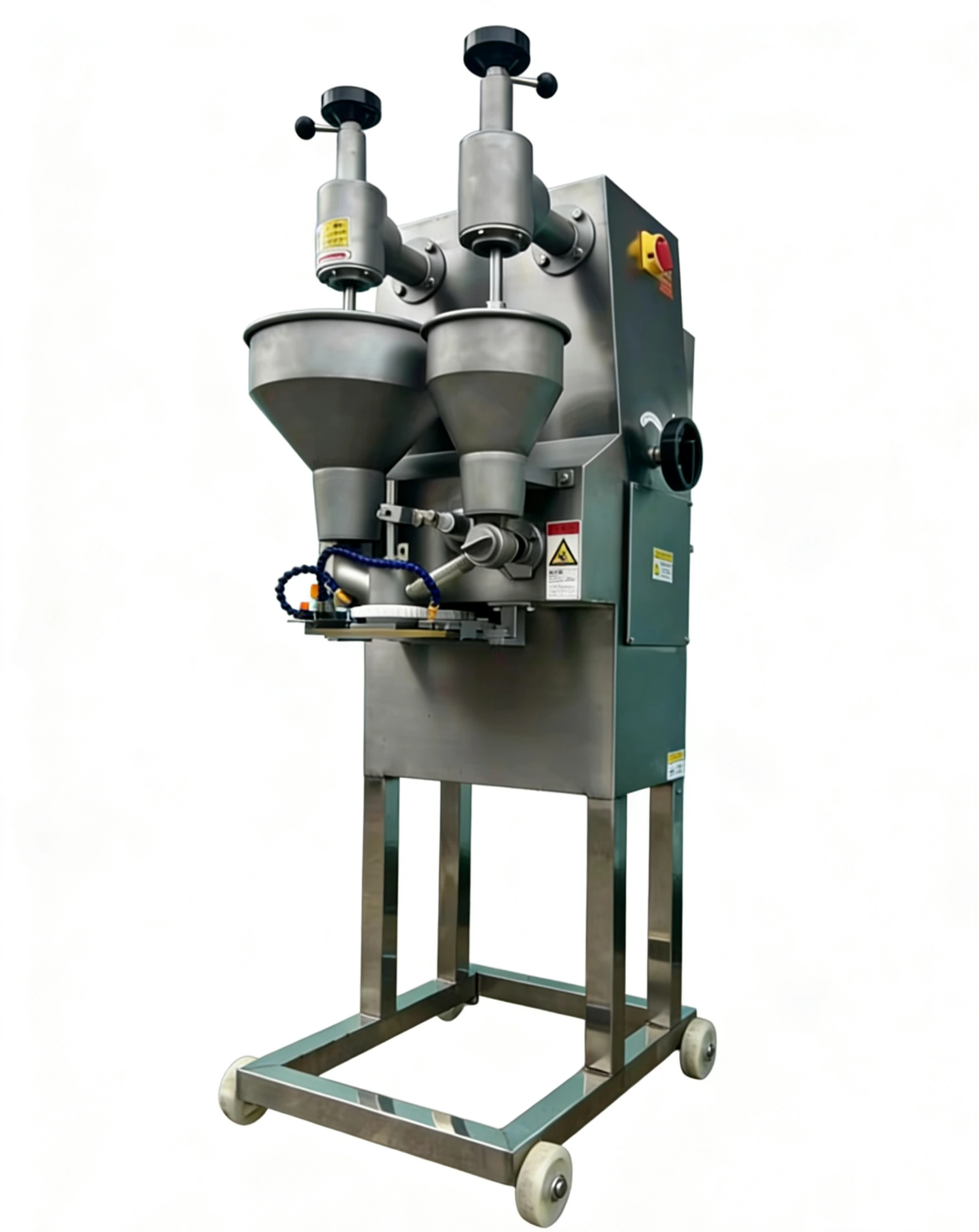 Automatic center filled meatball machine for large scale frozen food plants.